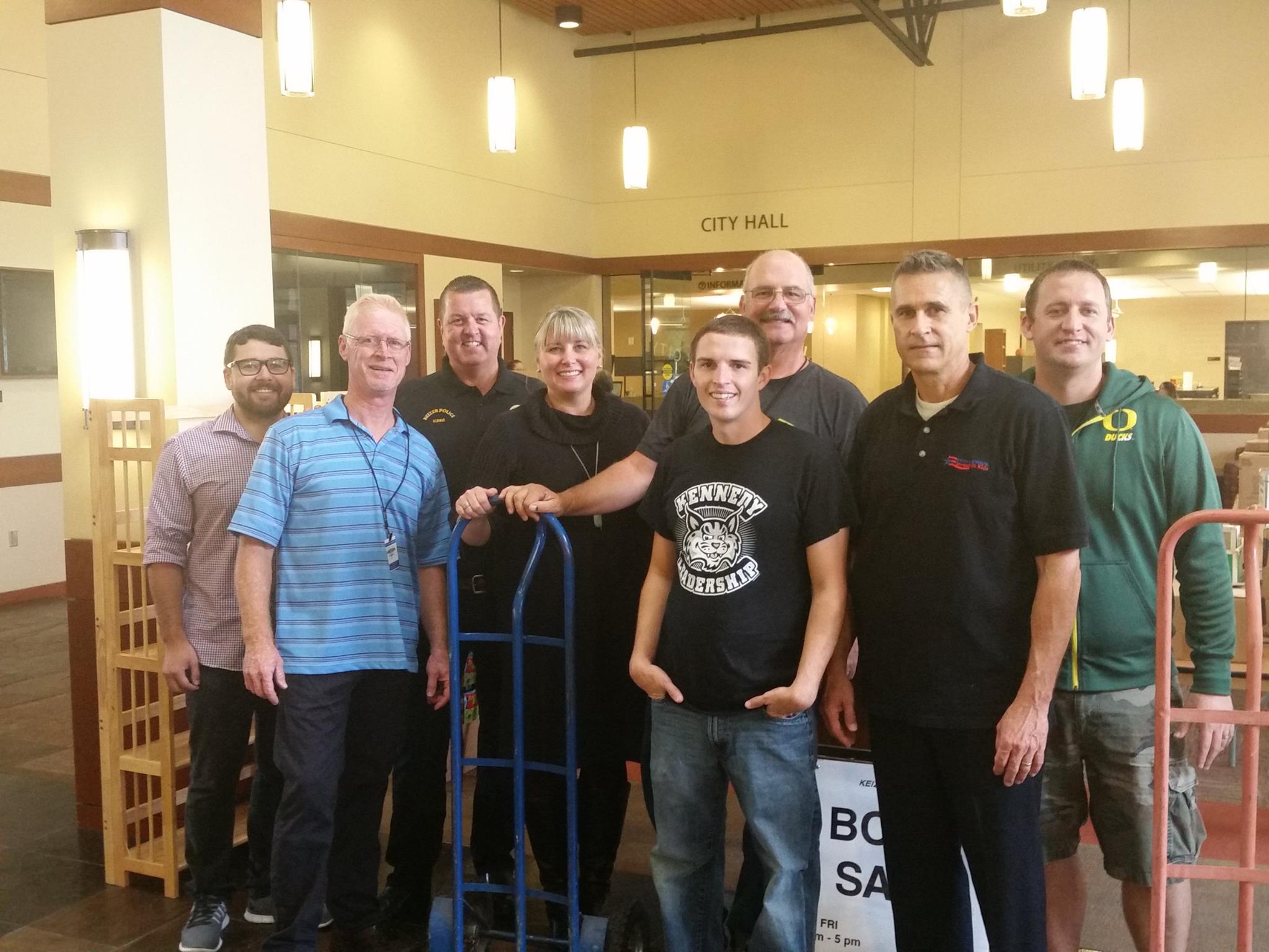 Group of volunteers with hand carts in Civic Center