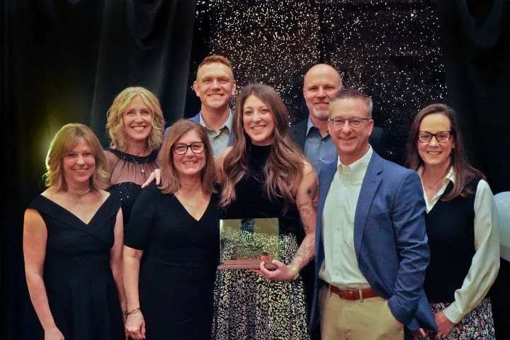 Keizer's 2023 Service to Education Award Winner, Brad Lomax, Teacher & Coach at McNary HS - with his family.